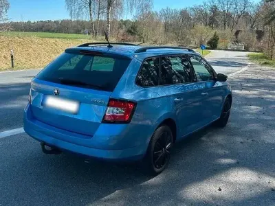 Używany Skoda Fabia 90 KM (66 kW) 2015 Niebieski Kombi