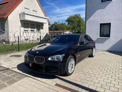 Second-hand BMW 750L M Sport 392 CP (288 kW) 2014 Albastru Berlinǎ