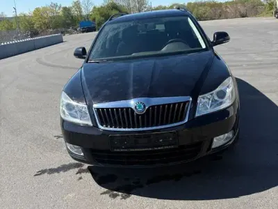 Second-hand Skoda Octavia Impuls Edition 105 CP (77 kW) 2011 Negru Break