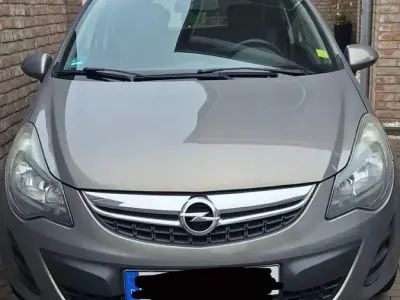 Używany Opel Corsa 69 KM (50 kW) 2014 Brązowy Hatchback