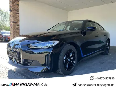 Gebraucht BMW i4 Sport Line 250 kW (340 PS) 2023 Schwarz ii/bonnet fluid black Limousine