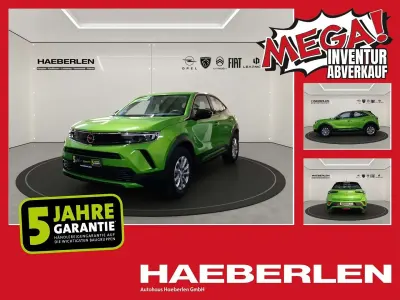 Gebraucht Opel Mokka Edition 136 PS (100 kW) 2023 Matcha green/ikone gruen (metallic) SUV