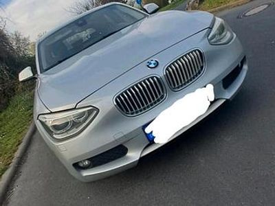 Second-hand BMW 116 136 CP (100 kW) 2011 Argintiu Hatchback