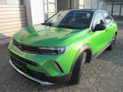 Gebraucht Opel Mokka-e Elegance 100 kW (136 PS) 2021 Matcha green/ikone gruen SUV
