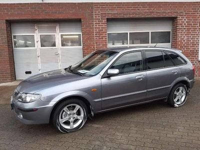 Gebraucht Mazda 323 98 PS (72 kW) 2003 Titaniumgrey metallic (25g) Limousine