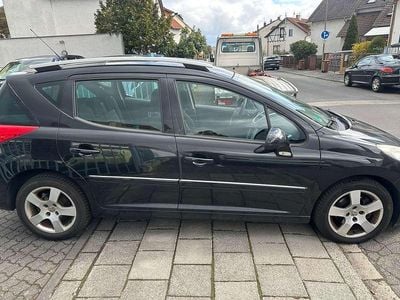 Gebraucht Peugeot 207 Premium 111 PS (81 kW) 2010 Schwarz obsidien/metallic Kombi