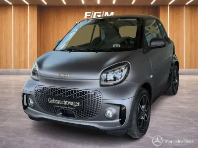 Gebraucht Smart ForTwo Coupé 60 kW (82 PS) 2024 Titania grey (matt) Kleinwagen