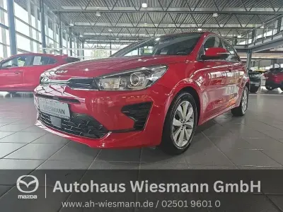 Gebraucht Kia Rio Vision 101 PS (74 kW) 2023 (beg) signalrot met. Kleinwagen
