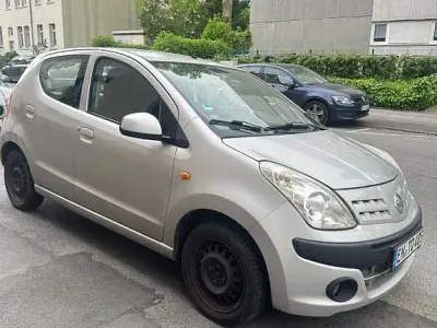 Gebraucht Nissan Pixo 68 PS (50 kW) 2009 Silber Kleinwagen