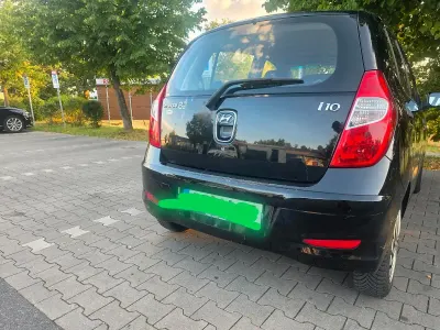 Gebraucht Hyundai i10 67 PS (49 kW) 2011 Schwarz Kleinwagen