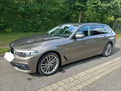 Gebraucht BMW 520 Sport Line 190 PS (139 kW) 2018 Braun Kombi