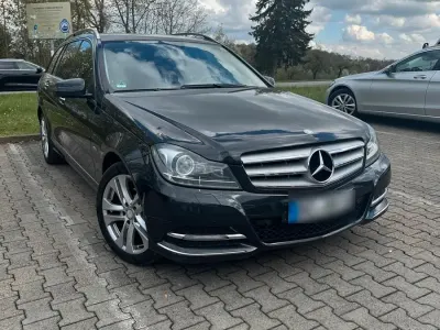 Second-hand Mercedes C200 136 CP (100 kW) 2012 Negru Break
