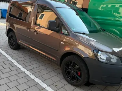 Gebraucht VW Caddy 104 PS (76 kW) 2011 Braun Van / Kleinbus