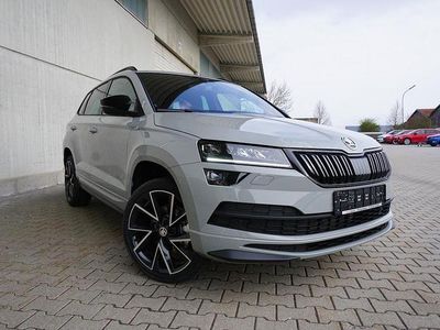 Steelgrau Gebraucht 2022 Skoda Karoq SportLine SUV | 29.950 € (Etwas zu teuer)
