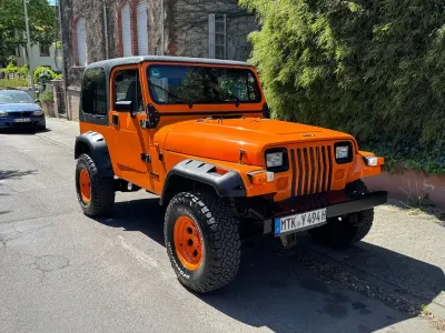 Gebraucht Jeep Wrangler 184 PS (135 kW) 1994 Orange SUV