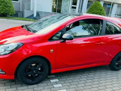 Usado Opel Corsa Color Edition 101 HP (74 kW) 2015 Vermelho Citadino