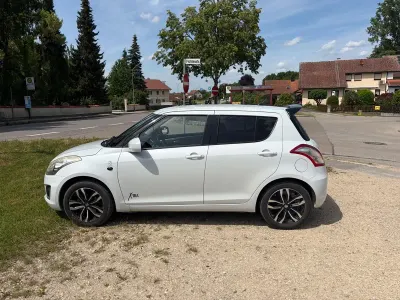 Gebraucht Suzuki Swift X-TRA 94 PS (69 kW) 2015 Weiß Kleinwagen