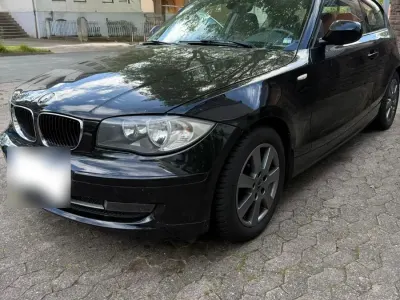 Gebraucht BMW 116 122 PS (89 kW) 2010 Schwarz Kleinwagen