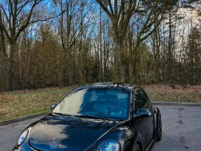 Gebraucht VW New Beetle 105 PS (77 kW) 2004 Schwarz Kleinwagen