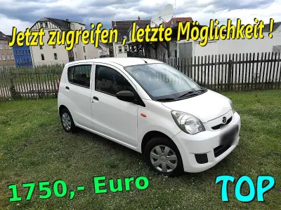 Gebraucht Daihatsu Cuore 69 PS (50 kW) 2011 Weiß Kleinwagen
