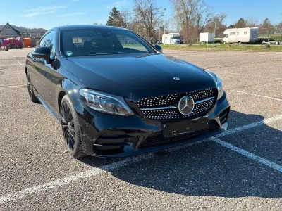 Second-hand Mercedes C300 AMG line 272 CP (200 kW) 2023 Negru Coupe
