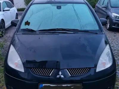 Begagnad Mitsubishi Colt Motion 95 HK (69 kW) 2007 Svart Sedan