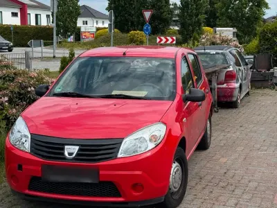 Gebraucht Dacia Sandero 75 PS (55 kW) 2009 Rot Kleinwagen