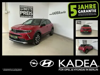 Używany Opel Mokka 131 KM (96 kW) 2023 Czerwony SUV