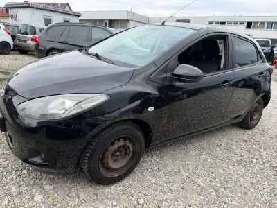 Gebraucht Mazda 2 Impuls 75 PS (55 kW) 2009 Brilliant black Kleinwagen