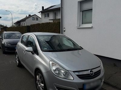 Second-hand Opel Corsa 101 CP (74 kW) 2010 Argintiu Hatchback