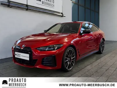 Gebraucht BMW i4 M Sport 400 kW (544 PS) 2025 Dragon fire rot Limousine