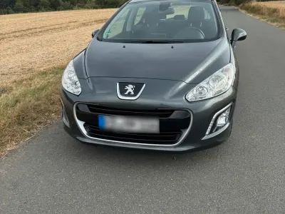 Gebraucht Peugeot 308 Style 115 PS (84 kW) 2013 Grau Limousine