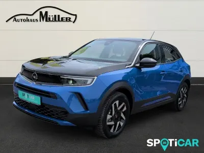Gebraucht Opel Mokka-e Elegance 100 kW (136 PS) 2024 Lackierung voltaic blue met/ty SUV