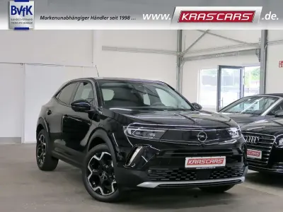 Gebraucht Opel Mokka-e Ultimate 100 kW (136 PS) 2022 Diamant schwarz/karbon schwarz SUV