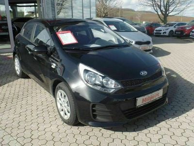 Gebraucht Kia Rio Attract 84 PS (61 kW) 2015 Schwarz metallic Kleinwagen