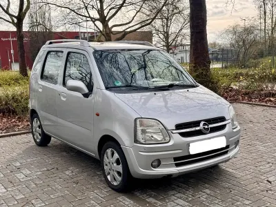 Używany Opel Agila 75 KM (55 kW) 2006 Srebrny Hatchback