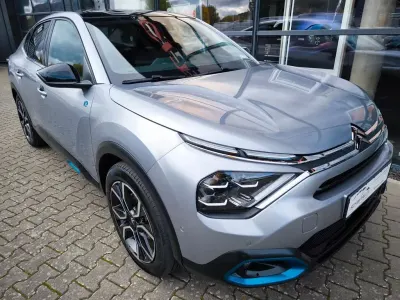 Używany Citroën e-C4 Shine 100 kW (136 KM) 2023 Szary Sedan/Limuzyna