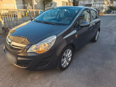 Gebraucht Opel Corsa Active 87 PS (63 kW) 2013 Braun Kleinwagen