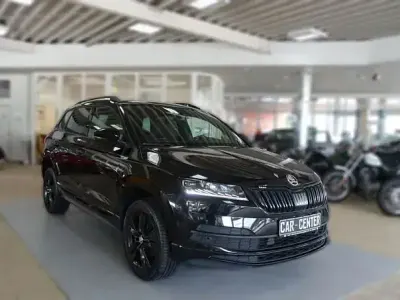 Gebraucht Skoda Karoq SportLine 150 PS (110 kW) 2020 Cerna magic/black magic (metallic) SUV