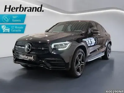 Gebraucht Mercedes GLC300e Night 320 PS (235 kW) 2021 Metalliclack obsidianschwarz Coupé