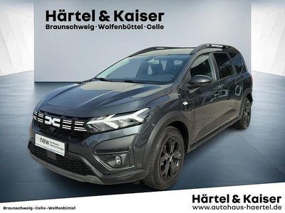 Gebraucht Dacia Jogger Extreme 110 PS (80 kW) 2023 Kometengraumetallic (grau) Van / Kleinbus
