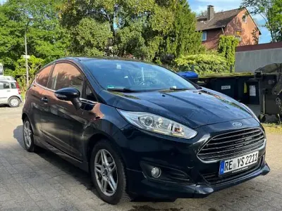 Gebraucht Ford Fiesta Individual 125 PS (91 kW) 2014 Schwarz Kleinwagen