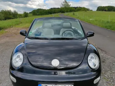 Gebraucht VW New Beetle 116 PS (85 kW) 2004 Schwarz Kleinwagen