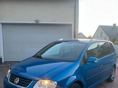 Second-hand VW Touran 150 CP (110 kW) 2004 Albastru Monovolum