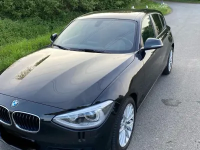 Gebraucht BMW 118 Sport Line 150 PS (110 kW) 2014 Schwarz Kleinwagen