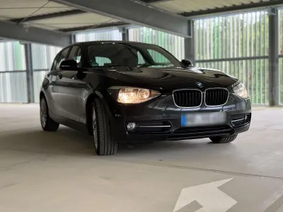 Gebraucht BMW 116 Sport Line 136 PS (100 kW) 2012 Schwarz Kleinwagen