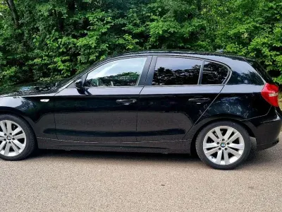 Gebraucht BMW 118 Advantage 143 PS (105 kW) 2010 Schwarz Kleinwagen