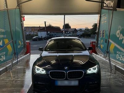 Second-hand BMW 520 190 CP (139 kW) 2014 Albastru Berlinǎ