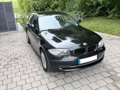 Second-hand BMW 116 122 CP (89 kW) 2010 Negru Hatchback