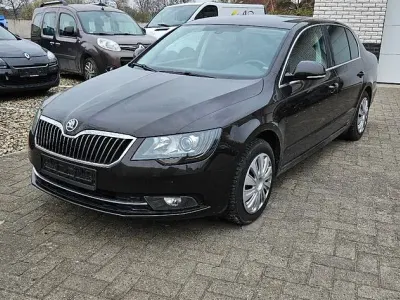 Używany Skoda Superb Exclusive 160 KM (117 kW) 2014 Brązowy Sedan/Limuzyna
